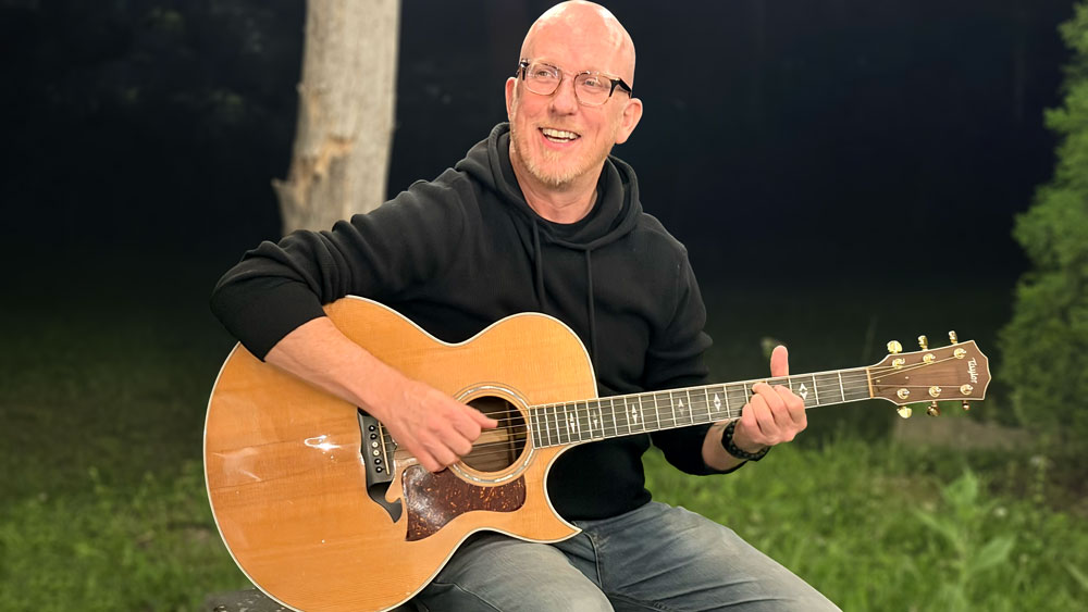 Playing guitar outside